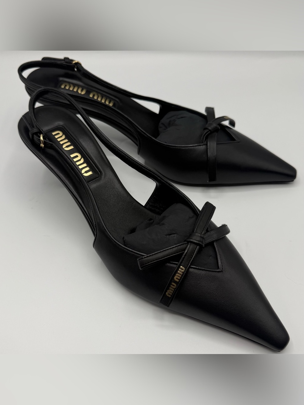NIB New Miu Miu Black Leather Logo Decolete Bow Sling Back Kitten Heel Pumps
